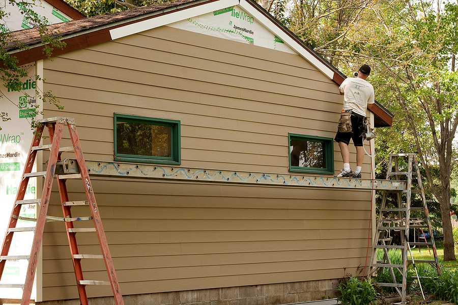Installing Cementboard Siding new construction roofing and siding project